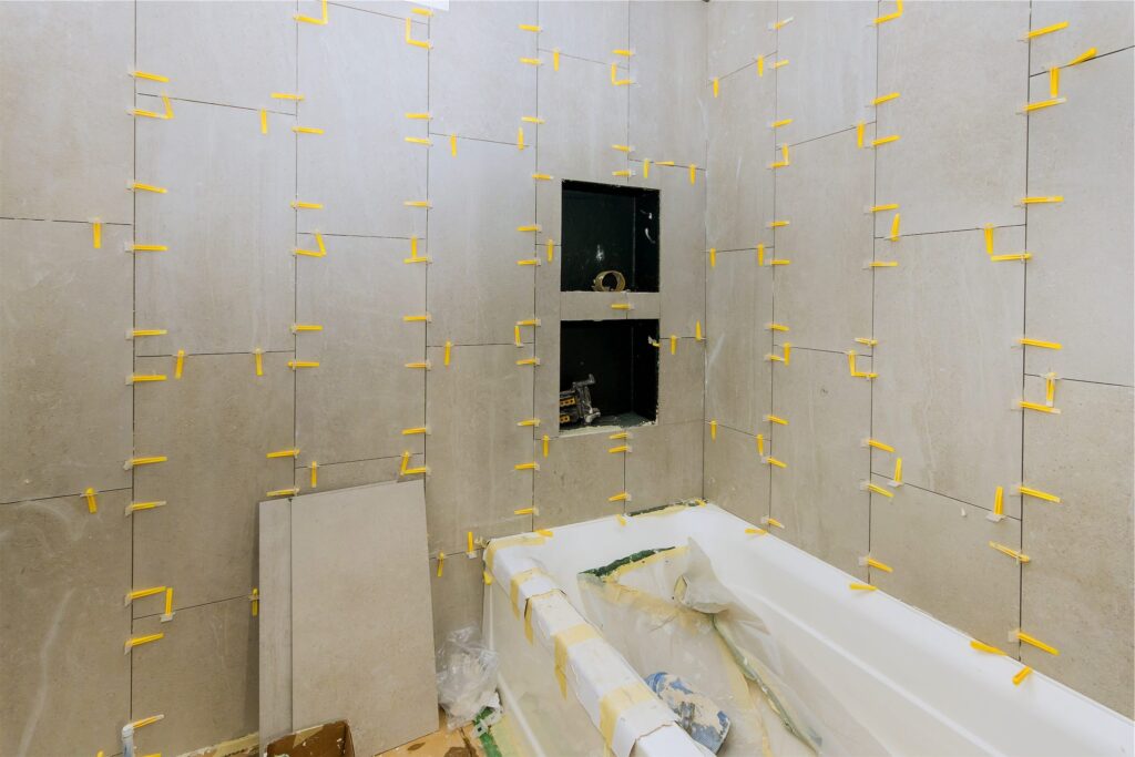 construction-work-installing-ceramic-tile-on-recon-2022-11-12-10-34-13-utc-3