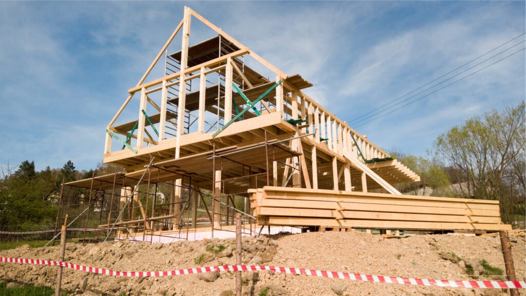 framing-of-a-new-wooden-house-under-construction-2021-08-29-16-24-39-utc-1
