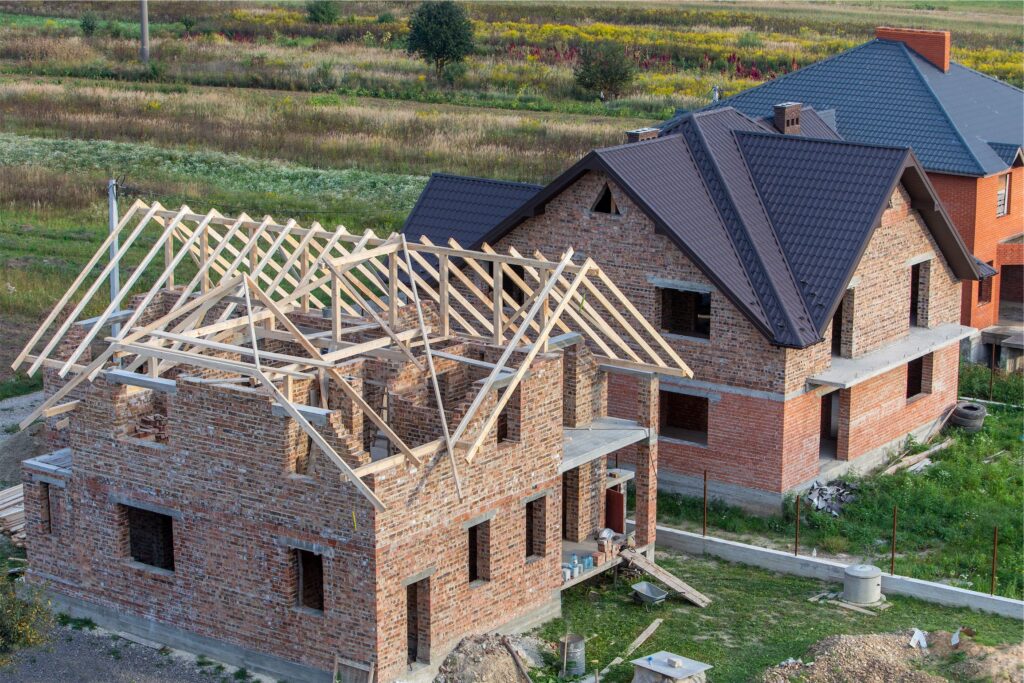 unfinished-brick-house-with-wooden-roof-structure-2022-01-11-03-01-52-utc-1